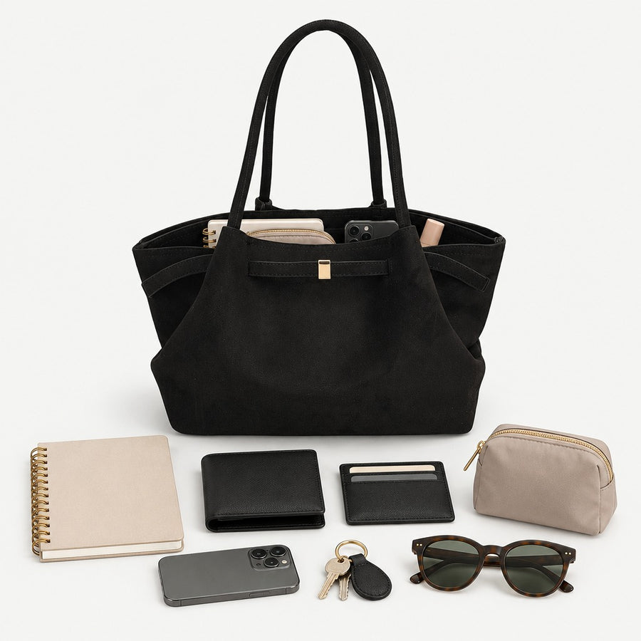 What fits inside the Ginny Suede bag
